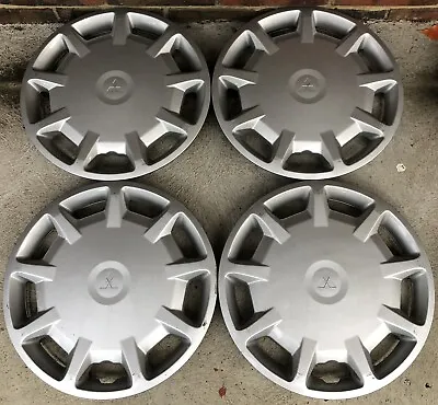 Mitsubishi Lancer / Mirage. 1997-2002..HUBCAPS X 4..14”..WHEEL COVERS CENTER CAP • $95