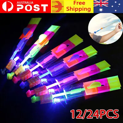12x Glow Stick Shooter Flash LED Light Helicopter Rocket Flying Toy Kid Fun Game • $12.58