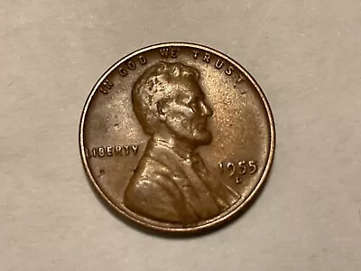 1955-D 1C  BRN/ RD Lincoln Cent “error IN GO  D WE TRUST.WIDE SPACE BETWEEN O D • $1177