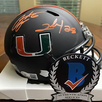 Clinton Portis AND Santana Moss Signed Miami Hurricanes Mini Helmet Beckett • $10