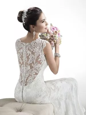 Melanie (Fit-and-Flare Ivory Wedding Dress) By Maggie Sottero  • $1000