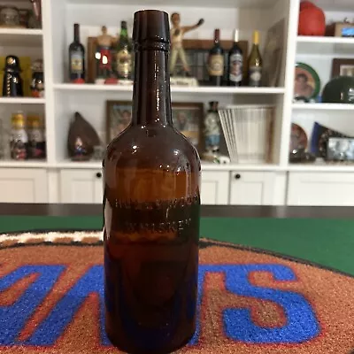 Vintage Amber Embossed Holly Wood Whiskey Bottle • $20