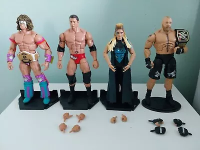 Lot Of 4 WWE Elite Figures (Ultimate Warrior Brock Lesnar Batista & Phoenix) • £50