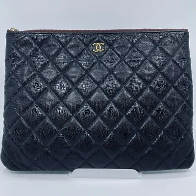 $1200 • Buy Chanel Classic Pouch In Black Calfskin Leather