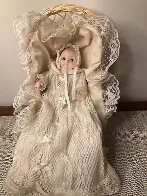 Porcelain Musical Baby In A Wicker Cradle Bassinet 9-1/2  Doll In Dress & Bonnet • $19.99