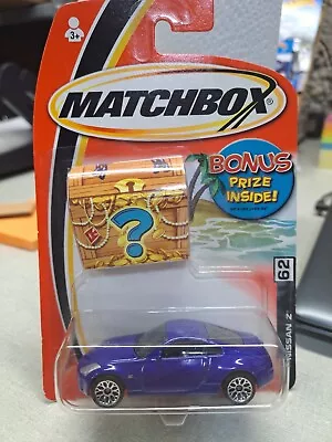 Matchbox Nissan Z (2004) Blue Toy Vehicle #62 - (Bonus Treasure Chest Card) • $11.89