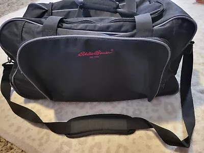 Eddie Bauer Luggage Rolling Duffle Bag Pull Out Handle Straps Black Ripstop 23  • $29.99