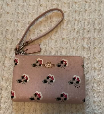 Pre/Owned Coach Small Pink Floral Wristlet • $25