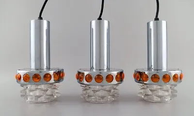 Raak Holland. Three Ceiling Pendants In Chromed Metal And Art Glass. 1970s. • $840