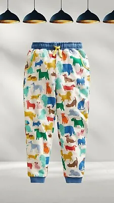 Ex Mini Boden Boy’s Printed Joggers In Oatmeal Marl Playful Pups (A Bit Defect) • £9.99