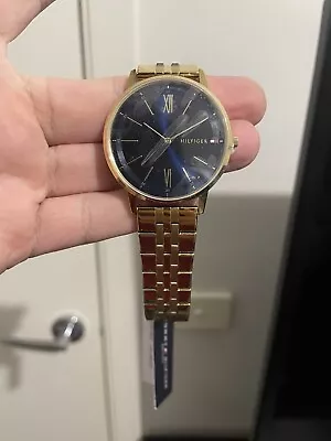 Gold Tommy Hilfiger Watch • $250