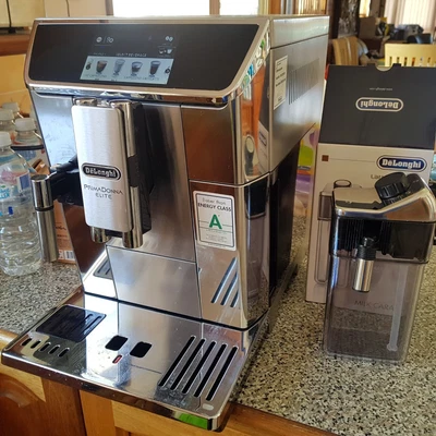 $1100 • Buy DeLonghi Prima Donna ELITE Coffee Machine Touch ECAM650.75 W/ New Milk