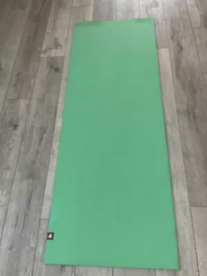 MANDUKA EKO Green/Blue Backing Yoga Mat. 71”x26”. Wt.: 6.5”. Handle Included. • $59.99