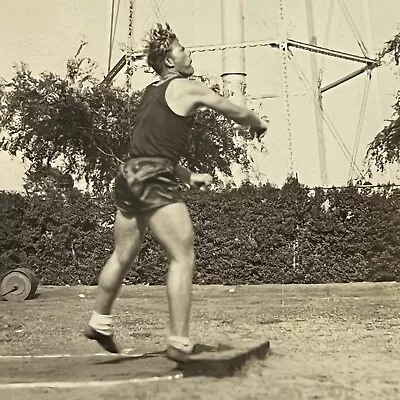 Vintage Snapshot Photograph Handsome Young Man Track & Field Shot Put Action • $12.95