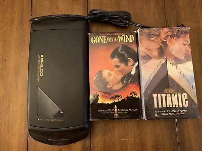 Philco VHS Video Cassette Rewinder With Titanic And Gone With The Wild VHS • $42.99