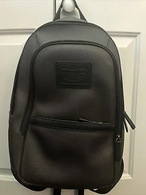 Coach Men’s  Leather & Canvas Backpack • $220