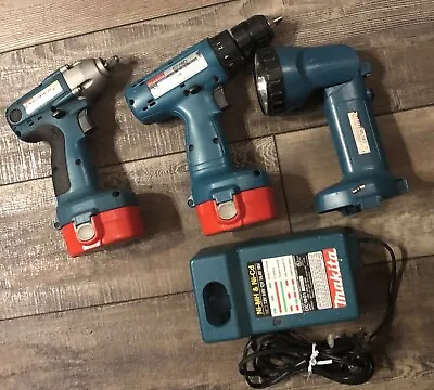 Makita 14.4 Impact Wrench 6933FD DRILL 6228D Charger Flashlight CORDLESS C VIDEO • $140