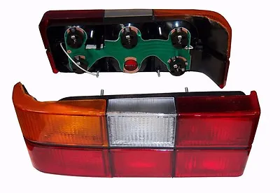 Volvo 240 244 Tail Light Complete Left Side W/ Black Molding MADE IN EU1372449 • $74.99