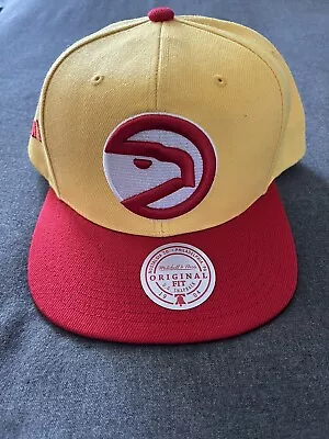 Atlanta Hawks Mitchell And Ness Original Fit O.G. SnapBack Hat [Yellow/Red] • $18