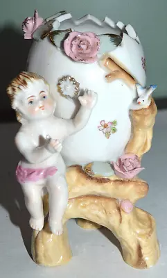 Vintage Ucagco Porcelain Cherub And Cracked Egg Bud Vase • $4.19