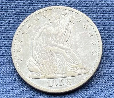 A 1856-O Seated Liberty Silver Half Dollar. • $81