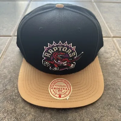 Toronto Raptors Mitchell & Ness Hardwood Classics DNA 2-Tone Snapback Hat • $24.99