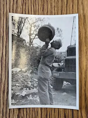 1940's MILITARY PHOTO. SOLDIER LIFTING A BEER BARREL. • $9.75