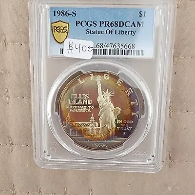 1986 S PCGS ELLIS ISLAND One Dollar PR68DCAM -STATUE LIBERTY-  TONED SILVER • $355