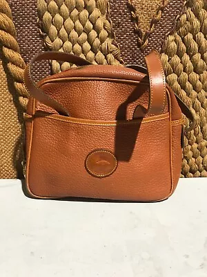 Dooney & Bourke Brown All Weather Leather Crossbody Purse. • $44.99