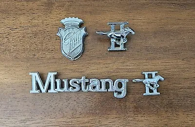 Ford Mustang II & Ghia Emblems Badges. OEM 12746 & 16702A • $24.95