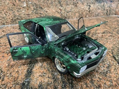 $1200 • Buy 1/18 Modified Holden LX Torana Hatchback In Green