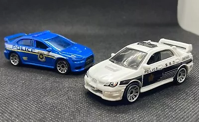 Matchbox Subaru Impreza Police Mitsubishi Lancer Evolution X Police Lot Of 2 • $3.75