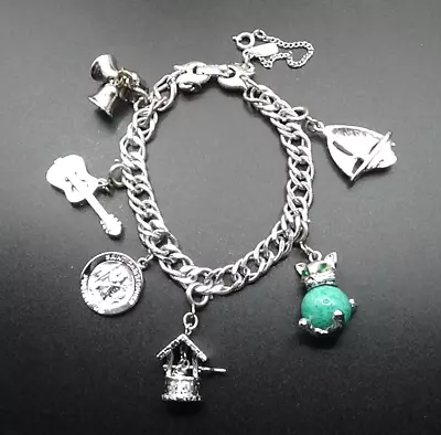 Vintage Mid-Century MONET Silver Tone Charm Bracelet With Six Dangle Charms • $42.95