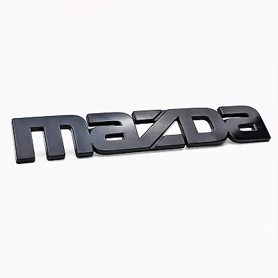 Mazda RX-7 1984-1985 Front Bumper Emblem  MAZDA  Nameplate Genuine OEM F023-51- • $39.15