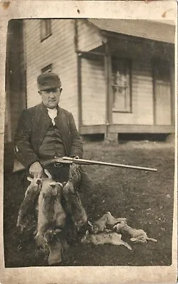 RABBIT HUNTER Antique Real Photo Postcard Rppc MAN WITH HUNTING RIFLE C1910 • $14