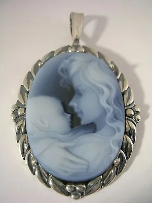 Cameo Mother And Child Pendant Set In A Sterling Silver Frame • $189.95