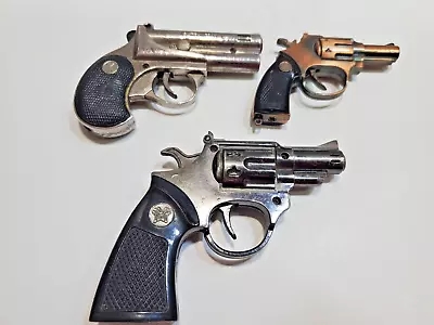 LOT OF 3 VINTAGE Gun. Pistol Revolver LIGHTERS  Collect / Fix / Display  6575/8 • $29.77