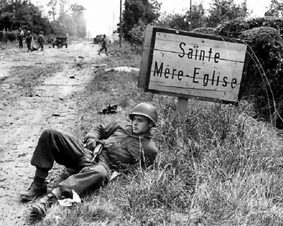 US Soldier At St. Mere-Eglise Sign During  D-Day 8x10 WWII WW2 Photo 981 • $7.43