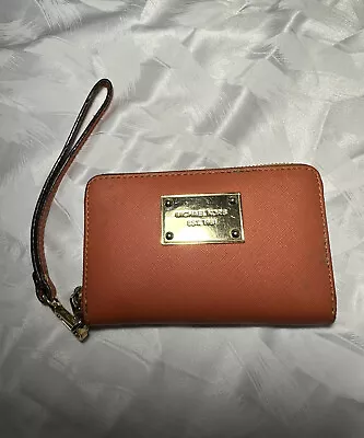 MICHAEL KORS Multi-Functional Burnt Orange Zip Around Wrist Wallet  • $19.99