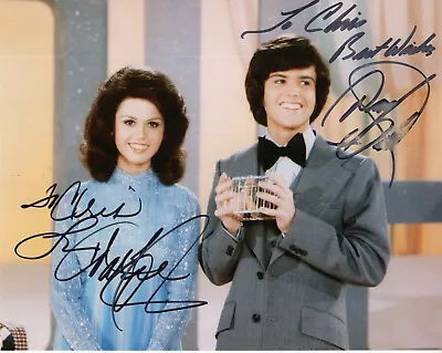 DONNY+MARIE OSMOND HAND SIGNED 8x10 COLOR PHOTO+COA       BOTH SIGNED TO CHRIS • $79.99