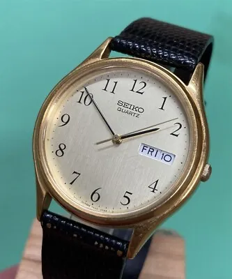 Vintage Seiko 7N43-8A99 / 8F68 Mens Quartz Watch W/ Day/Date Gold • $24.99
