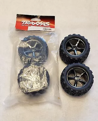 Traxxas 1/16 E Revo TRA7174A Gemini Chrome Wheels Talon Tires Set Of 4 Brand New • $25.50