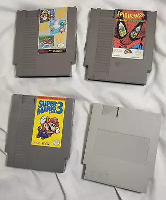 Lot X4 Nintendo Vintage Cartridges NES Cart Mario 3 Spiderman Multi Track • $79.99