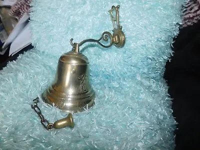 Vintage Brass Wall Mounted Bell With Raised Cherub Design Long Chain Clanger • £24