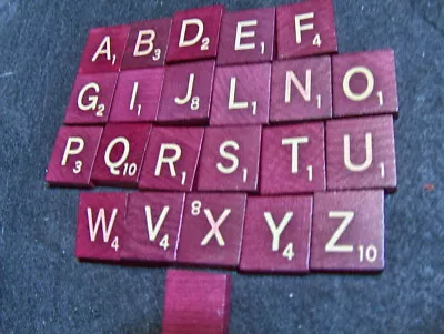 U PICK  SCRABBLE DELUXE BURGUNDY/MAROON TILES Gold Yellow LETTERS  • $1