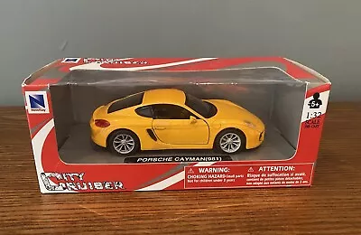 NEW-RAY CITY CRUISER Yellow Porsche Cayman 981 Boxed 1.32 Scale Die Cast Car • £3