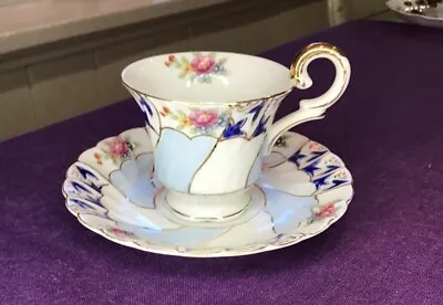 Ucagco China Blue/White Teacup And Saucer  w/  Floral Pattern  • $15