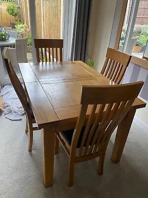 Large Extending Solid Oak Dining Table And 4 Chairs • £25