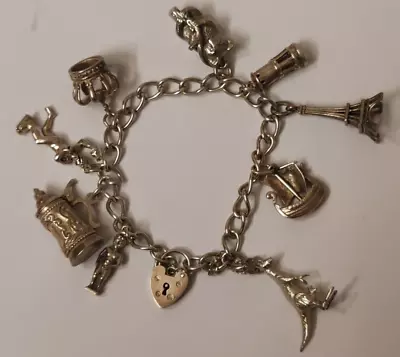 VINTAGE STERLING SILVER CHARM BRACELET W/9 Charms 37.9 Grams • $63.15