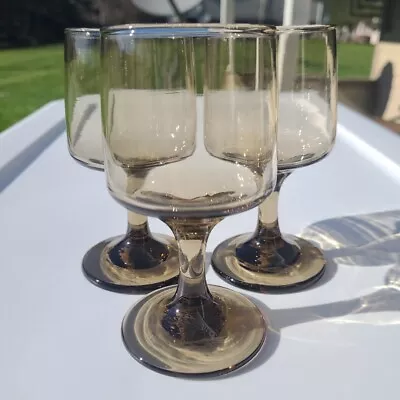 Set Of 3 Libbey Tawny Accent Gray Smoke Glass Wine Glasses Vintage 5  • $15.99